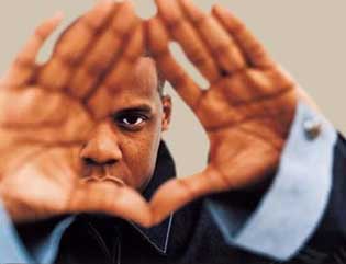 Jay-Z flashing Roc-A-Fella’s Roc sign